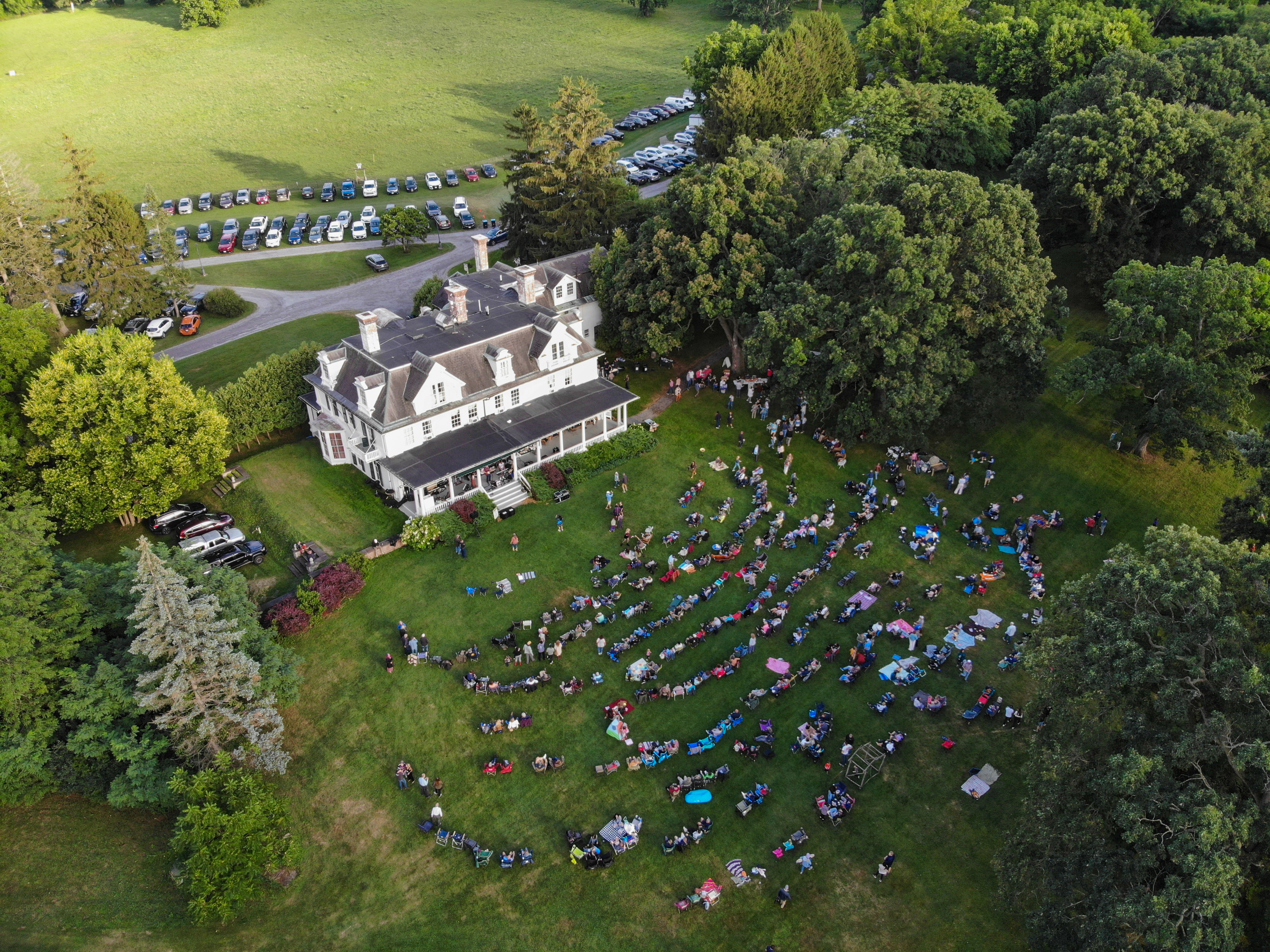 Aerial view of the Geneseo Jam Kitchen Homestead during a Sunset Concert Series event